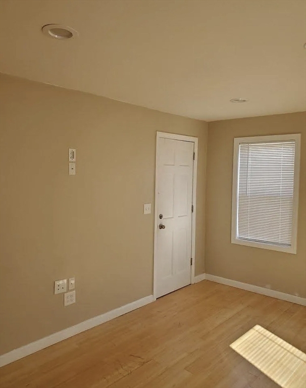 8 Marvel Street, Unit 2 Taunton, MA 02780 - Photo 15 of 17 a view of an empty room with a window