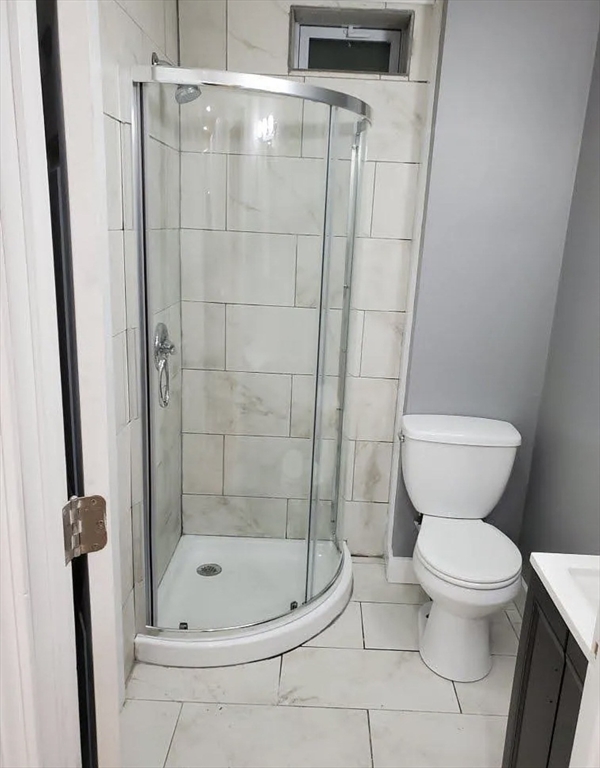 8 Marvel Street, Unit 2 Taunton, MA 02780 - Photo 10 of 17 a bathroom with a toilet and a shower