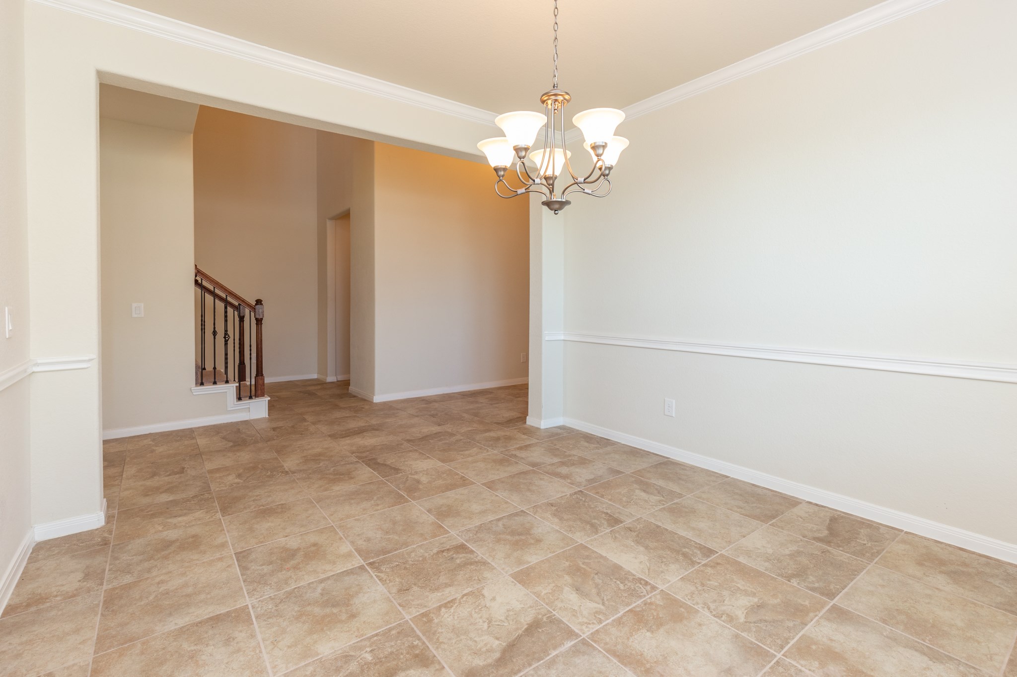10 Log House Court Tomball, TX 77375 - Photo 13 of 50 a view of a chandelier in big room and chandelier