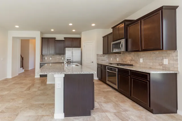 an empty room with closet area