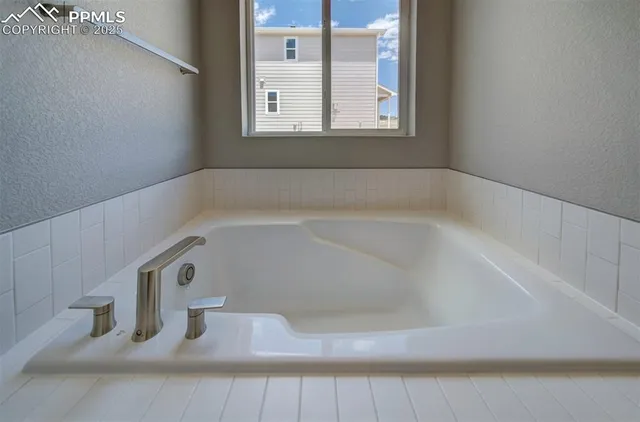 a bathroom with bathtub