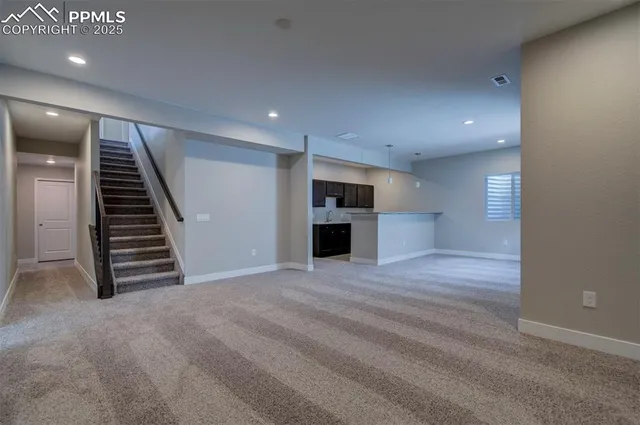 a view of a kitchen with a sink and a kitchen