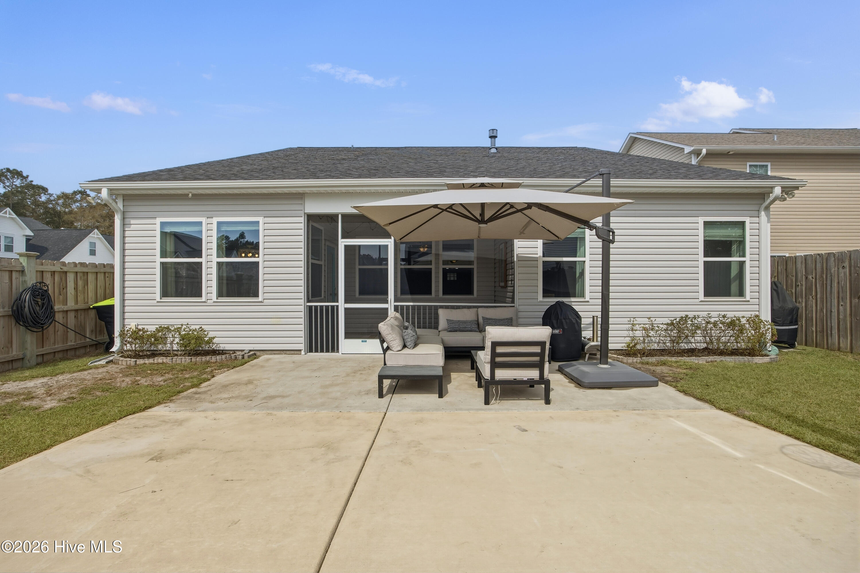 61 Chickadee Way Hampstead, NC 28443 - Photo 7 of 52 Extended Patio