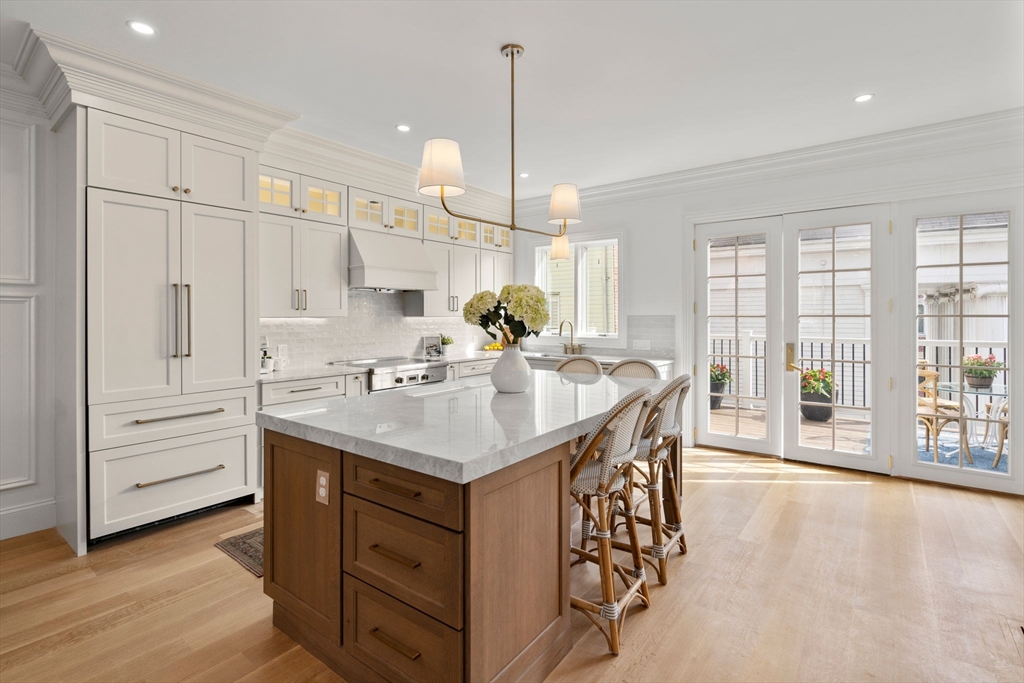 32 High Street Boston, MA 02129 - Photo 1 of 38 a kitchen with a sink cabinets and window