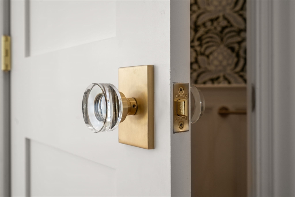 32 High Street Boston, MA 02129 - Photo 11 of 38 a close view of a utility room with dryer and washer