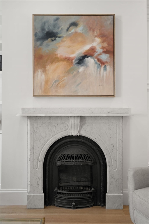 32 High Street Boston, MA 02129 - Photo 14 of 38 a view of a livingroom with a fireplace