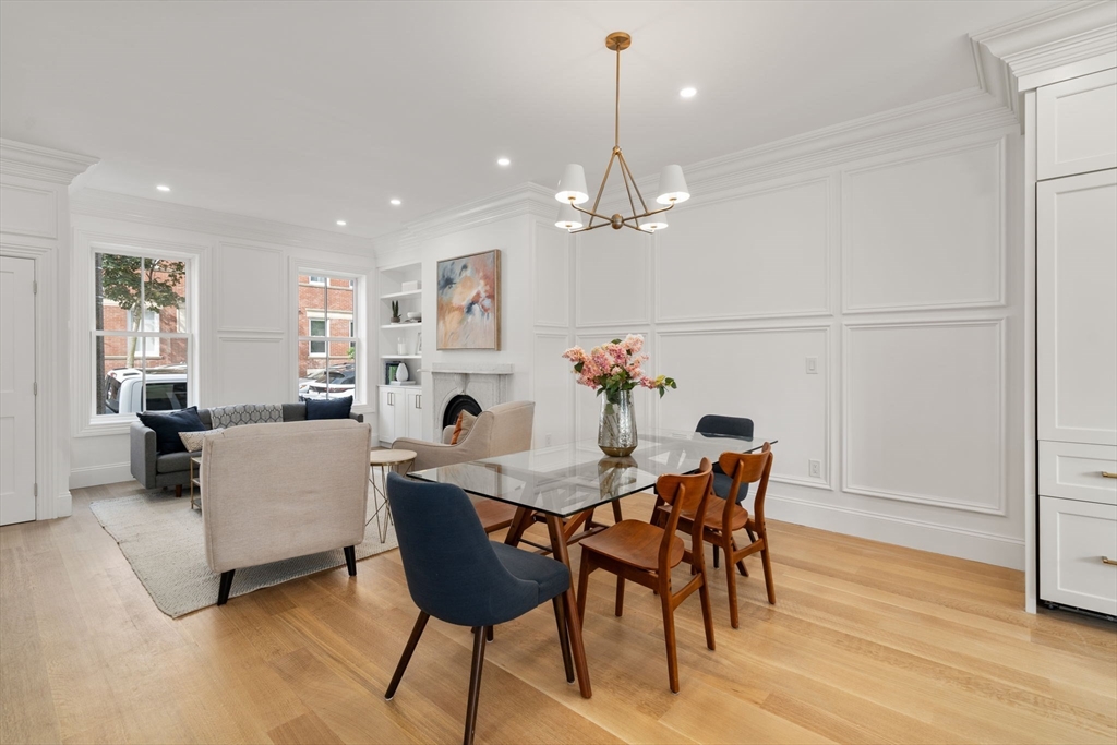 32 High Street Boston, MA 02129 - Photo 15 of 38 a view of a dining room with furniture and wooden floor