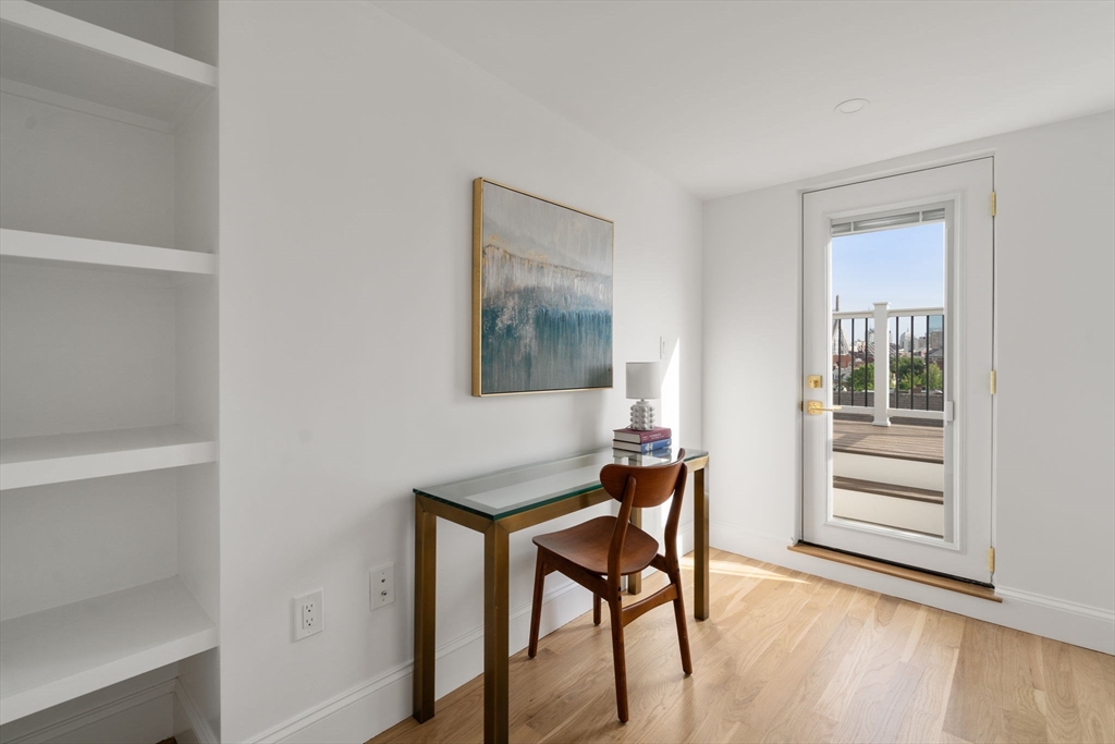 32 High Street Boston, MA 02129 - Photo 27 of 38 a workspace room with furniture and wooden floor