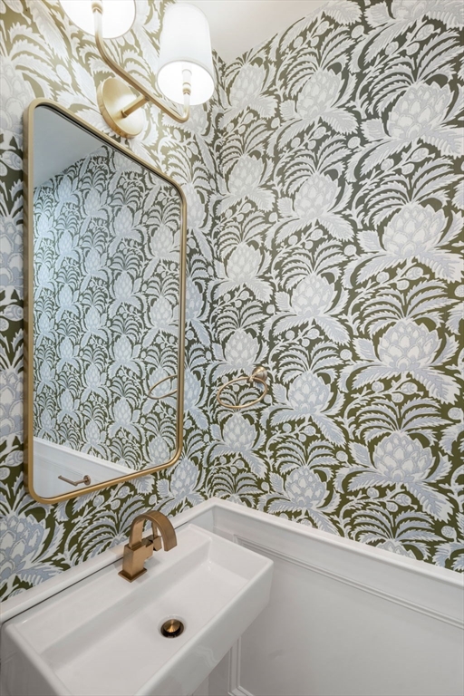 32 High Street Boston, MA 02129 - Photo 10 of 38 a bathroom with a sink and a mirror