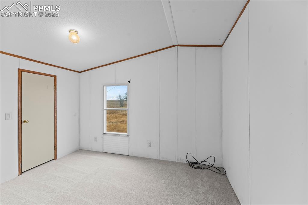 41275 Truckton Road Rush, CO 80833 - Photo 17 of 32 a view of an empty room with windows