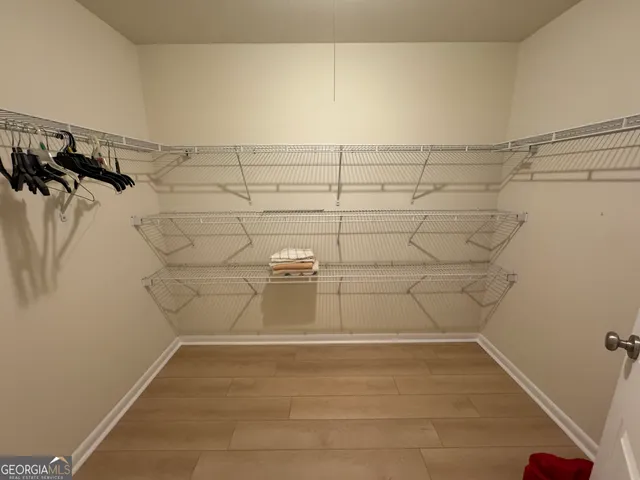 a view of a room with racks on the wall