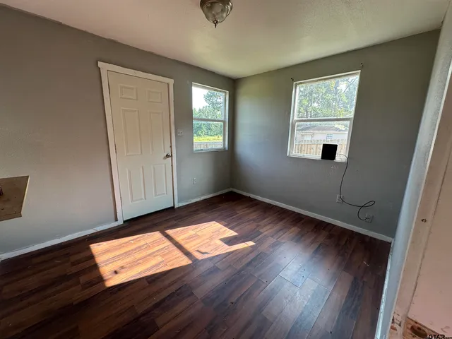 a view of a backyard of the house