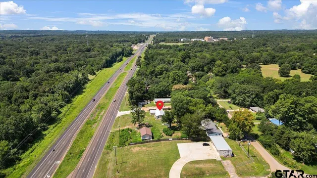 a view of city and swimming pool