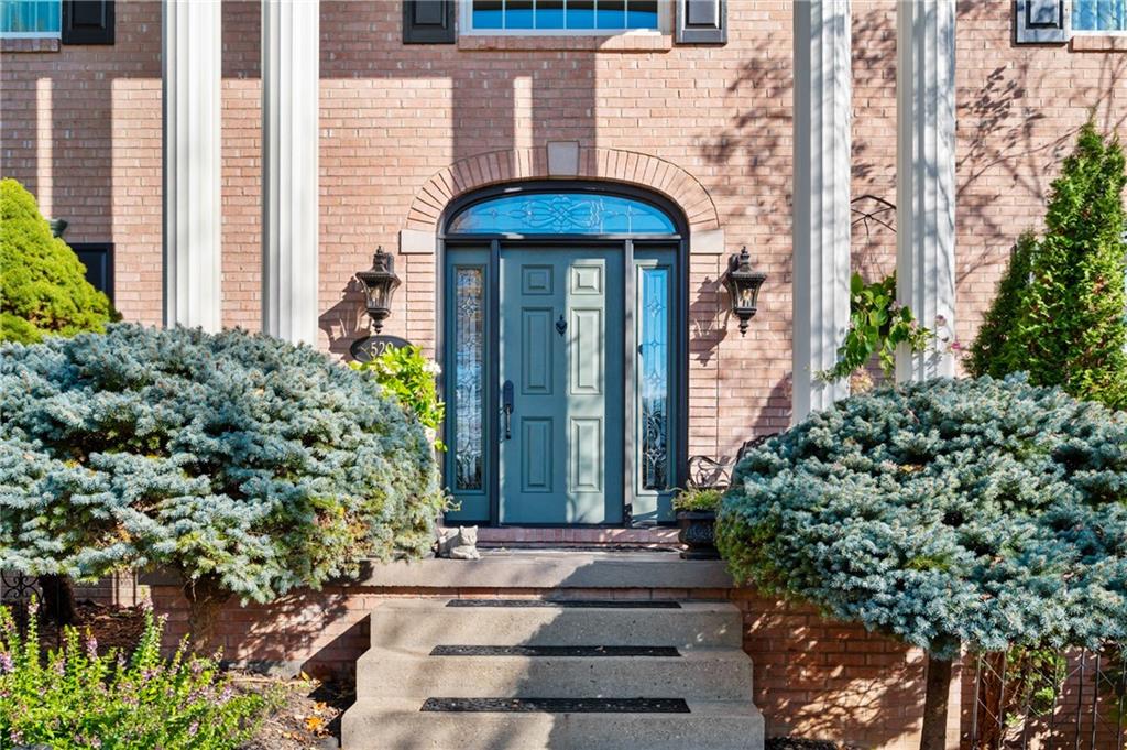 520 Colony Court Gibsonia, PA 15044 - Photo 2 of 45 a front view of a house with a yard