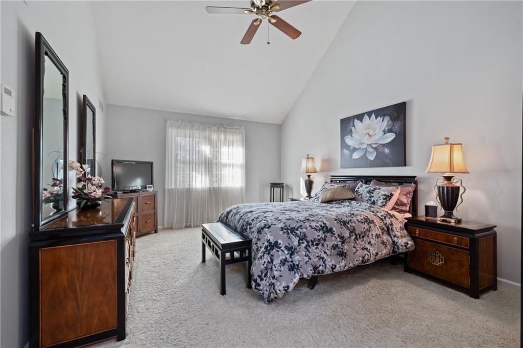 520 Colony Court Gibsonia, PA 15044 - Photo 25 of 45 a bedroom with a bed and a dresser in it