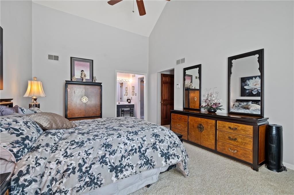 520 Colony Court Gibsonia, PA 15044 - Photo 26 of 45 a bedroom with a bed and wooden floor