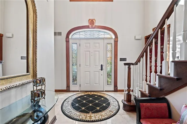 a view of a livingroom with furniture and hardwood