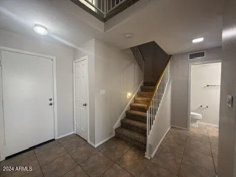 a view of an entryway with staircase