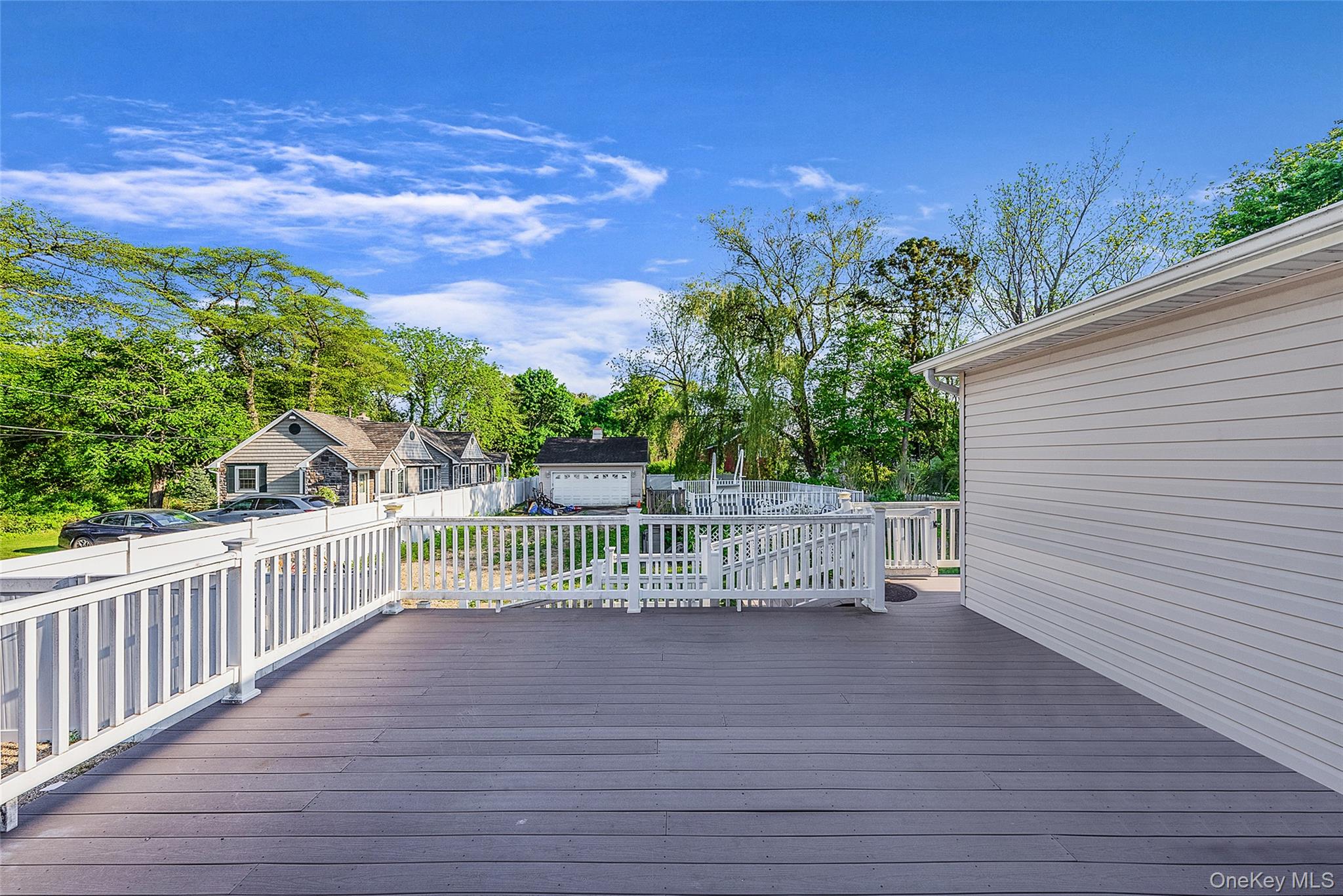 80 George Street Babylon, NY 11702 - Photo 4 of 41 a view of a deck with a yard