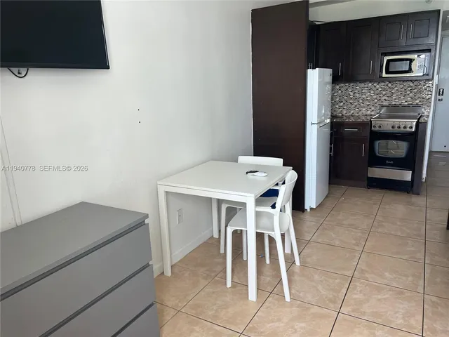 a utility room with washer and dryer