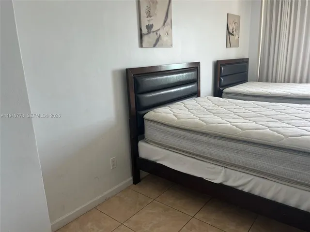 a bathroom with a toilet and a bathtub