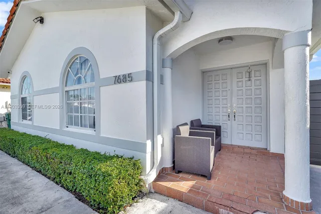a kitchen with stainless steel appliances a sink and a stove