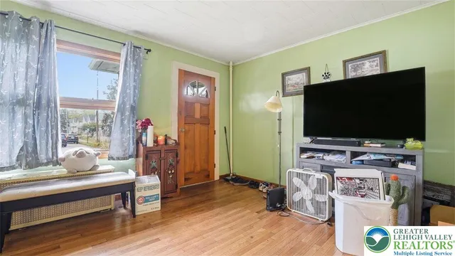 a view of dining table and chairs