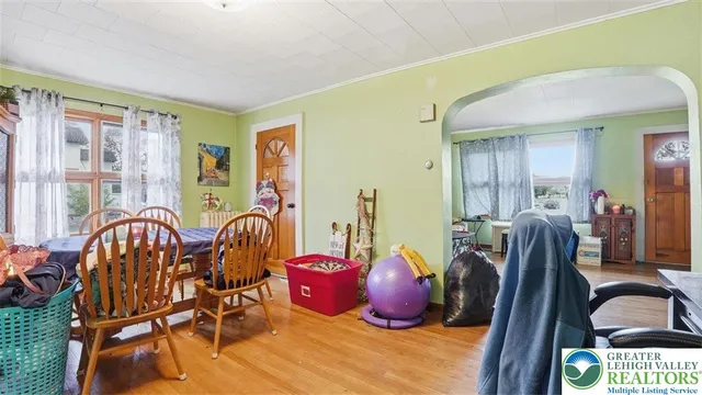 a bathroom with a bathtub and a window