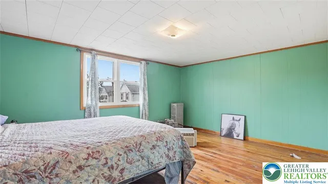 a bathroom with a sink a mirror and shower