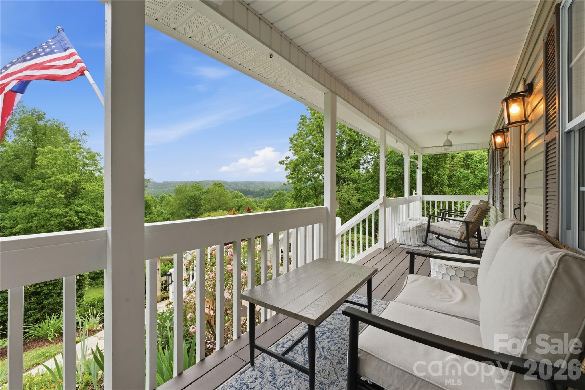 15 Raccoon Point Canton, NC 28716 - Photo 9 of 48 a view of a two chairs in the deck