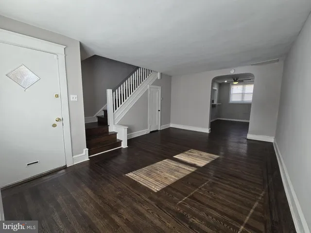 a view of entryway with wooden floor