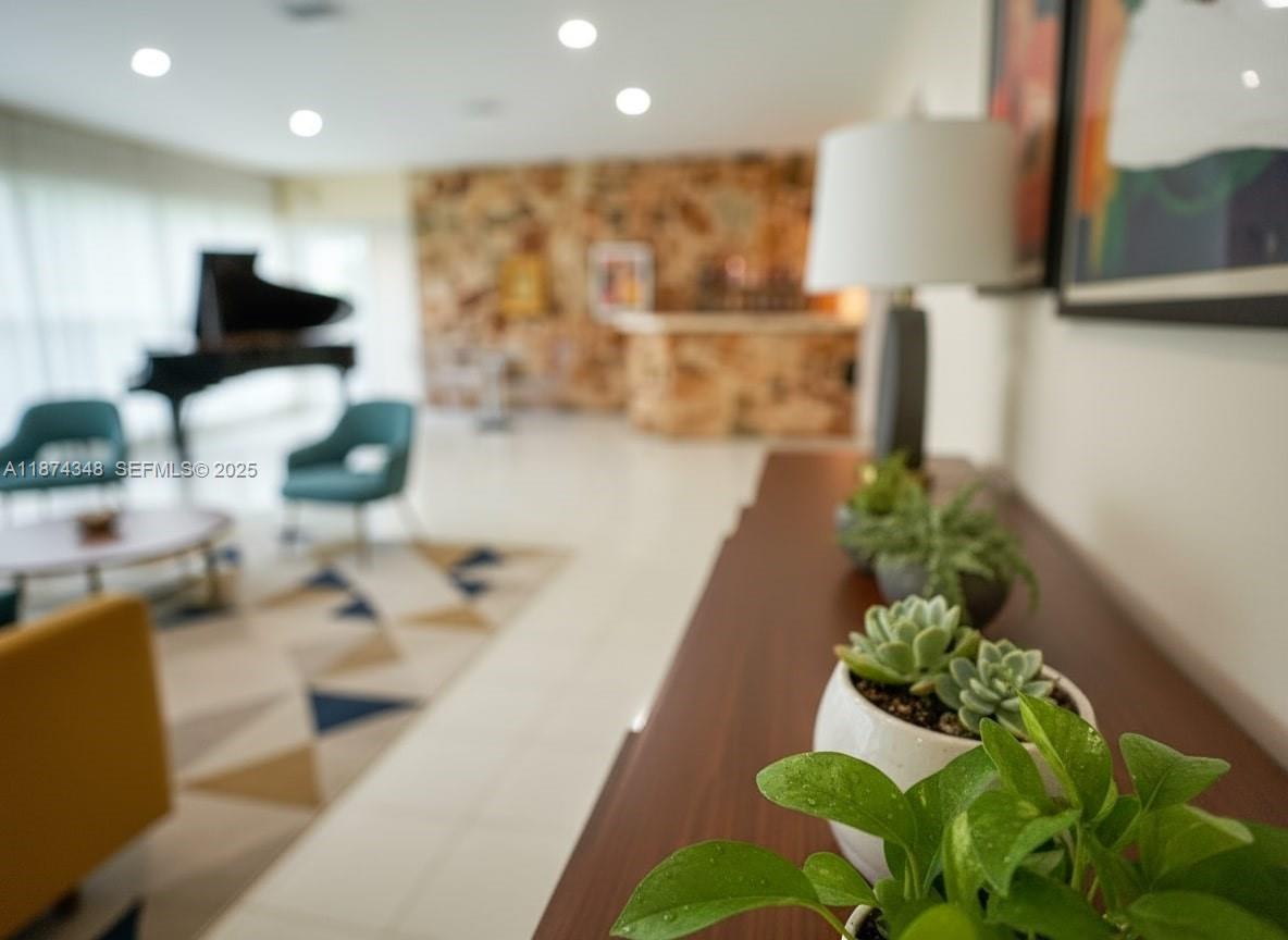 40 Southwest 30th Road Miami, FL 33129 - Photo 23 of 54 a view of living room with furniture and a potted plant