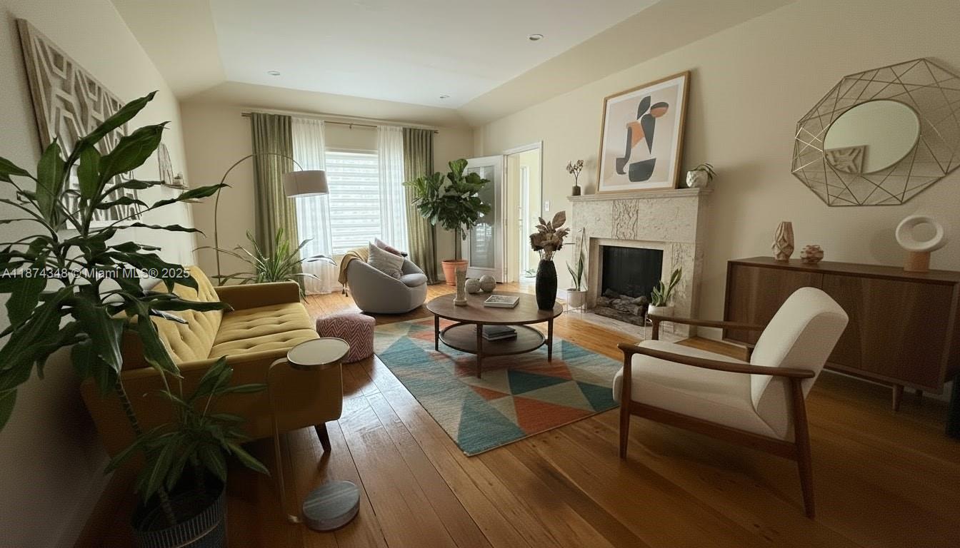 40 Southwest 30th Road Miami, FL 33129 - Photo 27 of 54 a living room with furniture and a fireplace