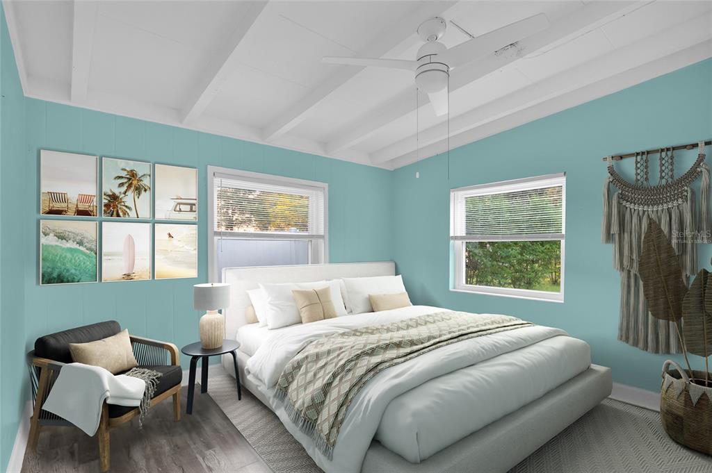 2313 River Ridge Road DeLand, FL 32720 - Photo 29 of 63 a bedroom with a bed and a large window