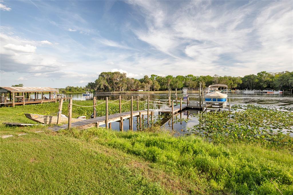 2313 River Ridge Road DeLand, FL 32720 - Photo 43 of 63 a view of a lake with houses in the back