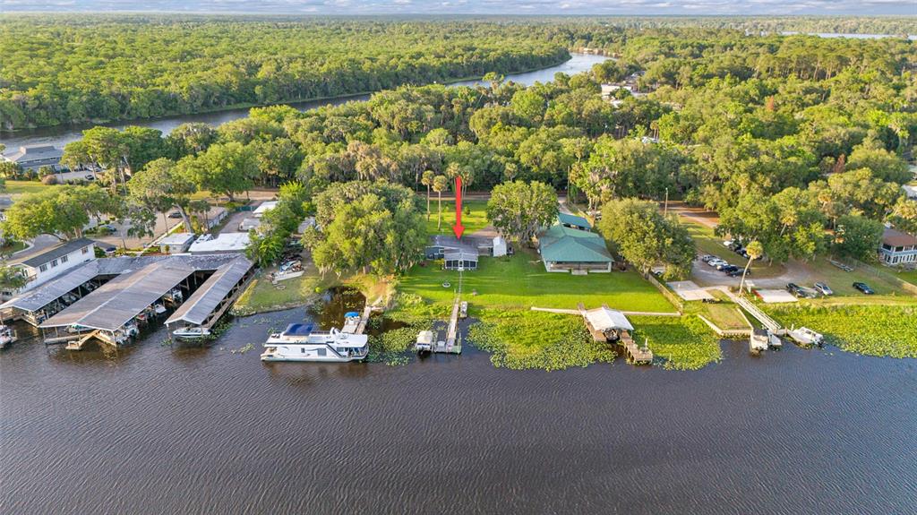 2313 River Ridge Road DeLand, FL 32720 - Photo 53 of 63 an aerial view of a houses with outdoor space