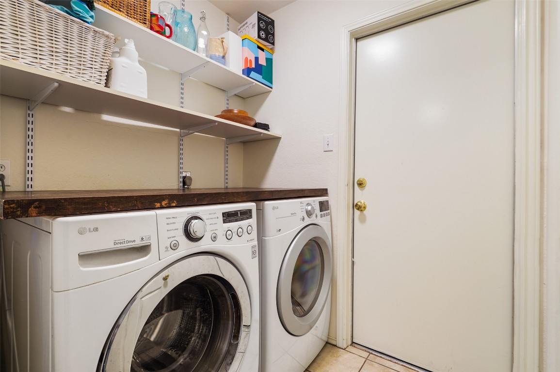 1422 Wheatfall Lane Austin, TX 78748 - Photo 14 of 29 a utility room with dryer and washer