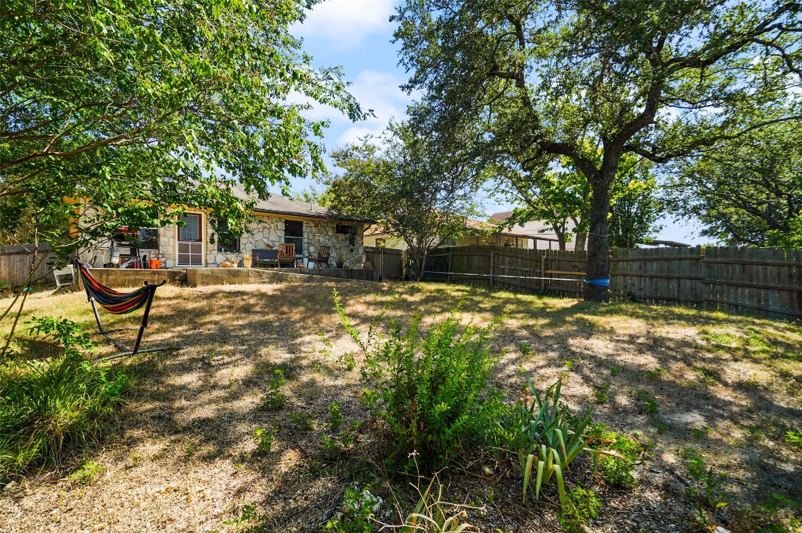 1422 Wheatfall Lane Austin, TX 78748 - Photo 25 of 29 a view of a house with backyard and sitting area