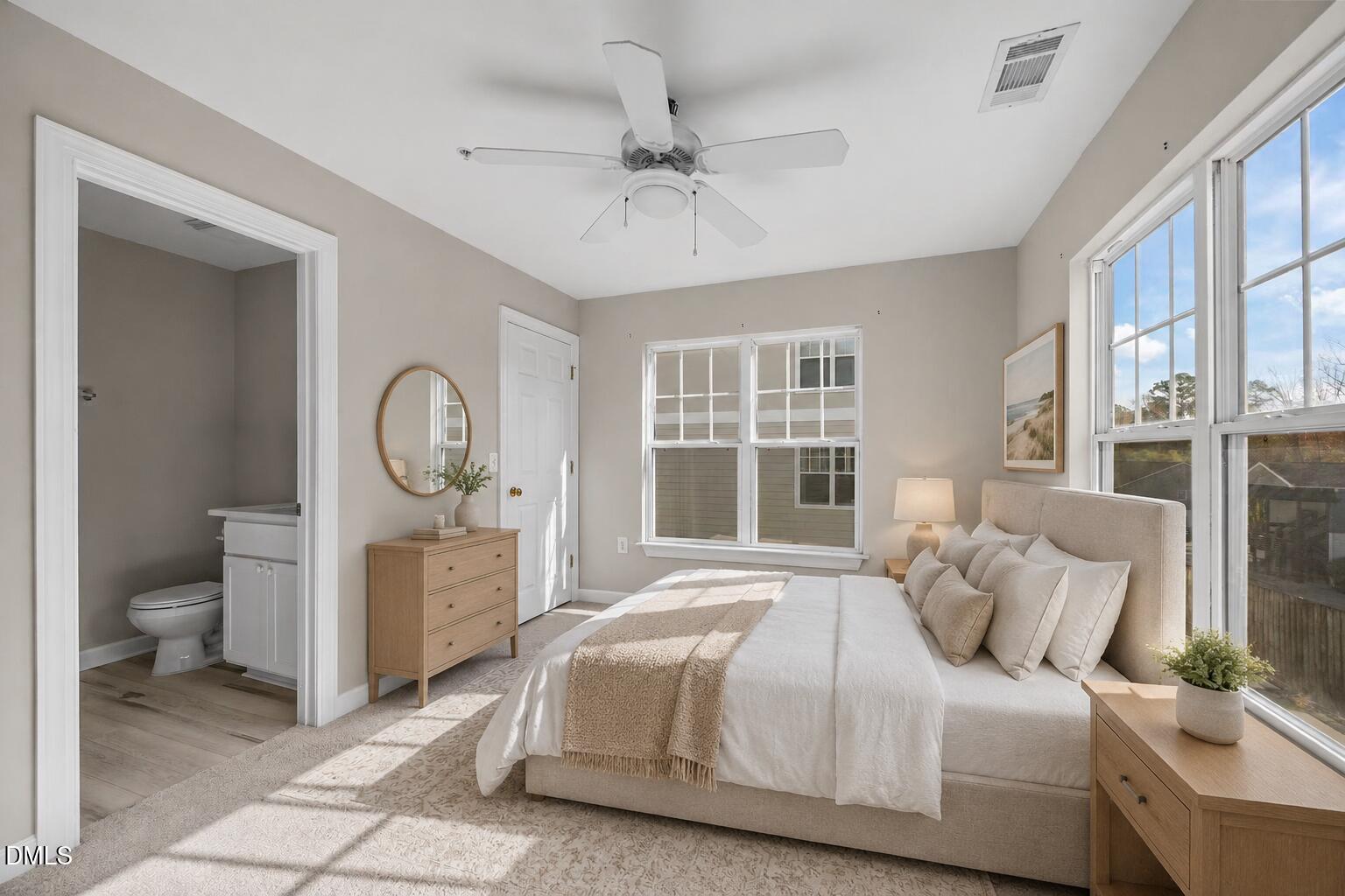 929 Morreene Road, Unit A23 Durham, NC 27705 - Photo 18 of 41 a bedroom with a large bed and a window
