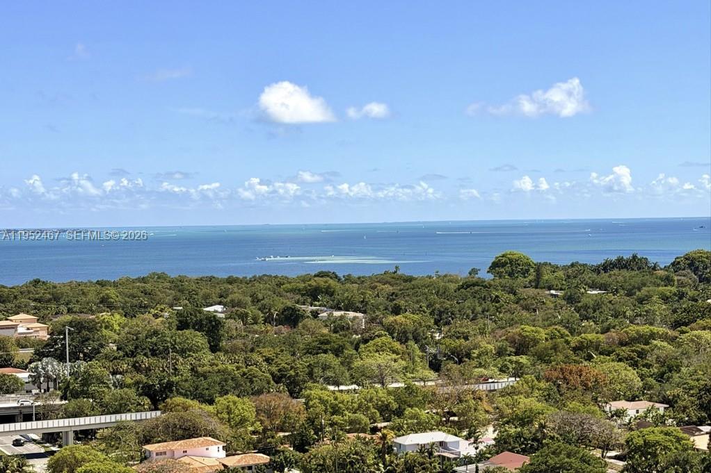 2525 Southwest 3rd Avenue, Unit 1709 Miami, FL 33129 - Photo 2 of 15 a view of a city with sunset