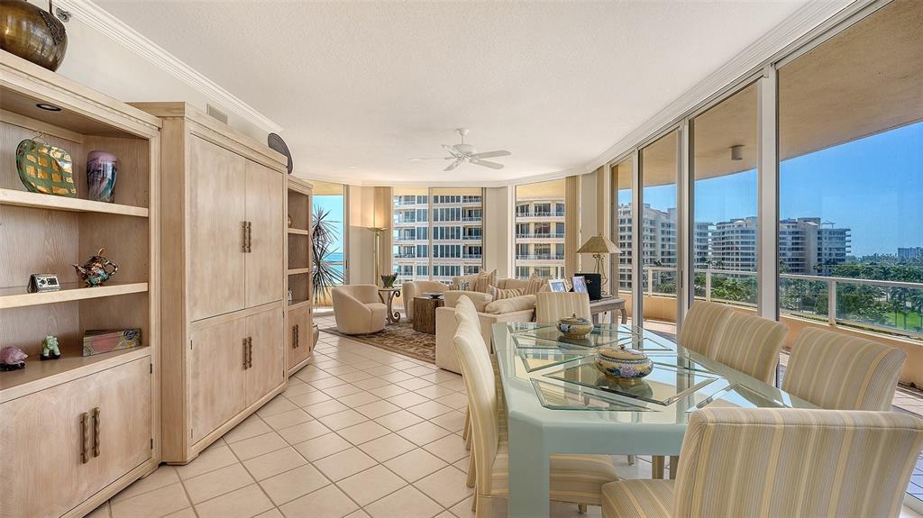 3060 Grand Bay Boulevard, Unit 155 Longboat Key, FL 34228 - Photo 11 of 67 a living room with furniture and a large window