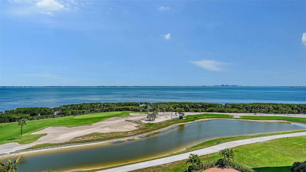 3060 Grand Bay Boulevard, Unit 155 Longboat Key, FL 34228 - Photo 34 of 67 a view of an outdoor space and a lake view