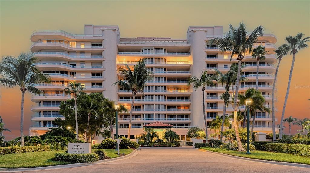 3060 Grand Bay Boulevard, Unit 155 Longboat Key, FL 34228 - Photo 56 of 67 a front view of a building with street view