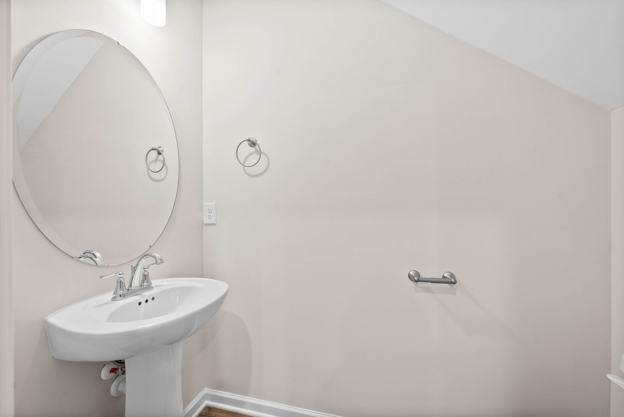 175 Addi Street Pleasant View, TN 37146 - Photo 12 of 22 a bathroom with a sink a mirror and vanity