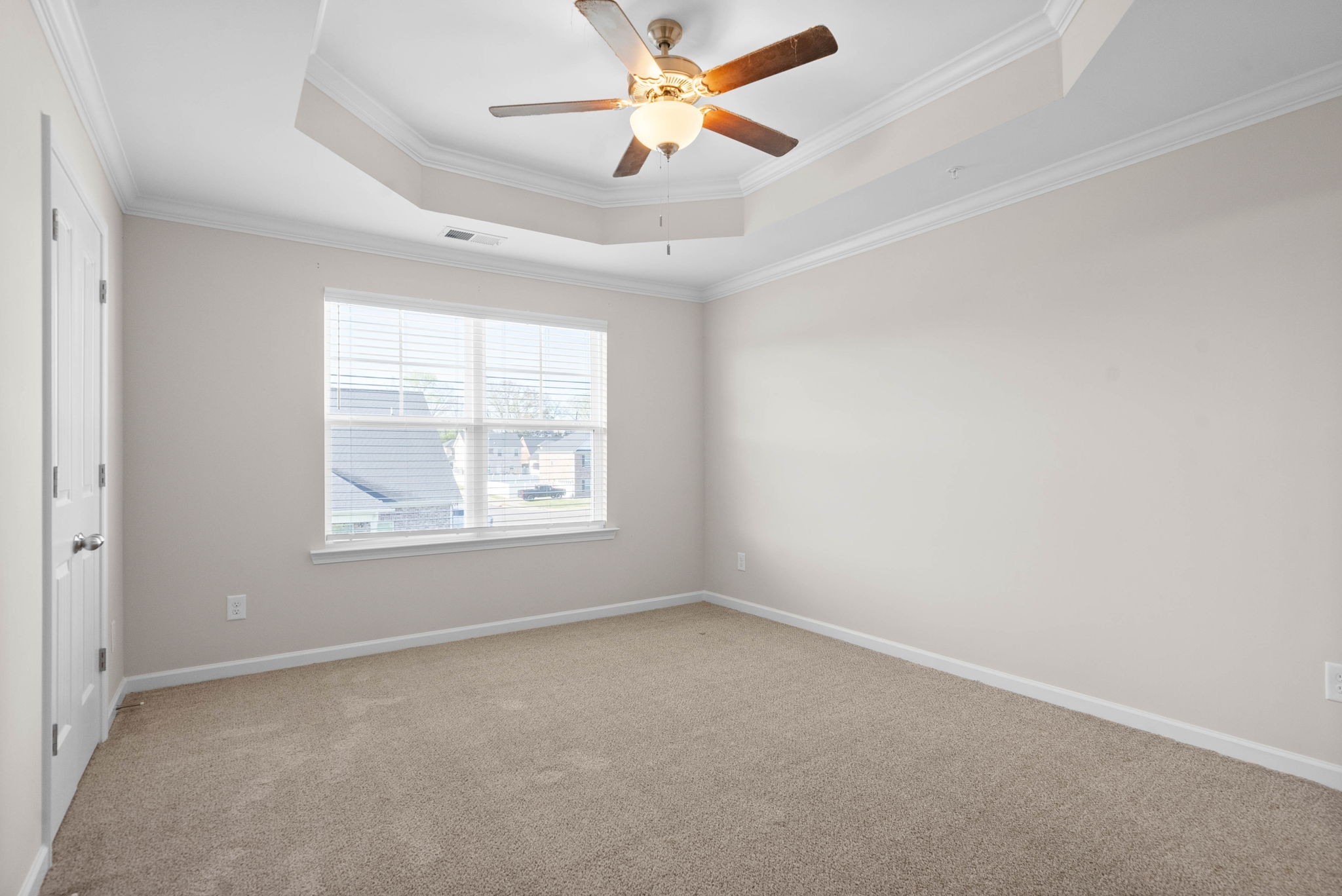 175 Addi Street Pleasant View, TN 37146 - Photo 17 of 22 an empty room with a window and a fan