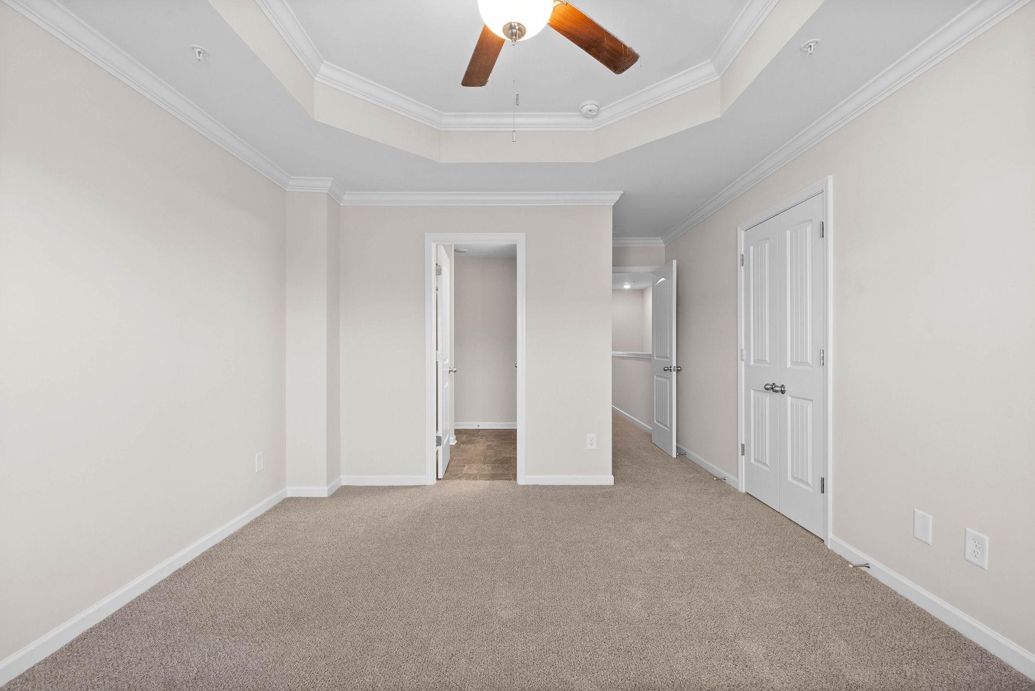 175 Addi Street Pleasant View, TN 37146 - Photo 18 of 22 an empty room with closet and a ceiling fan