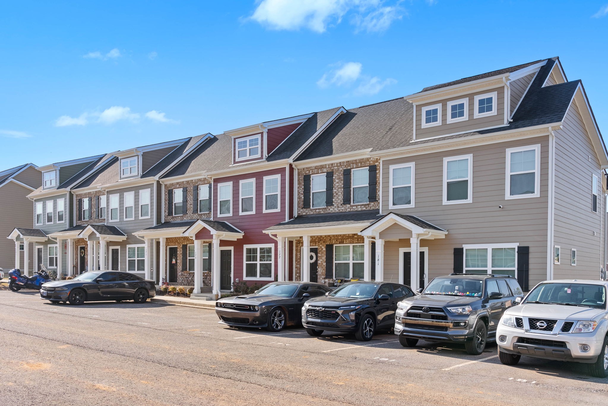 175 Addi Street Pleasant View, TN 37146 - Photo 2 of 22 a front view of a building with parking space