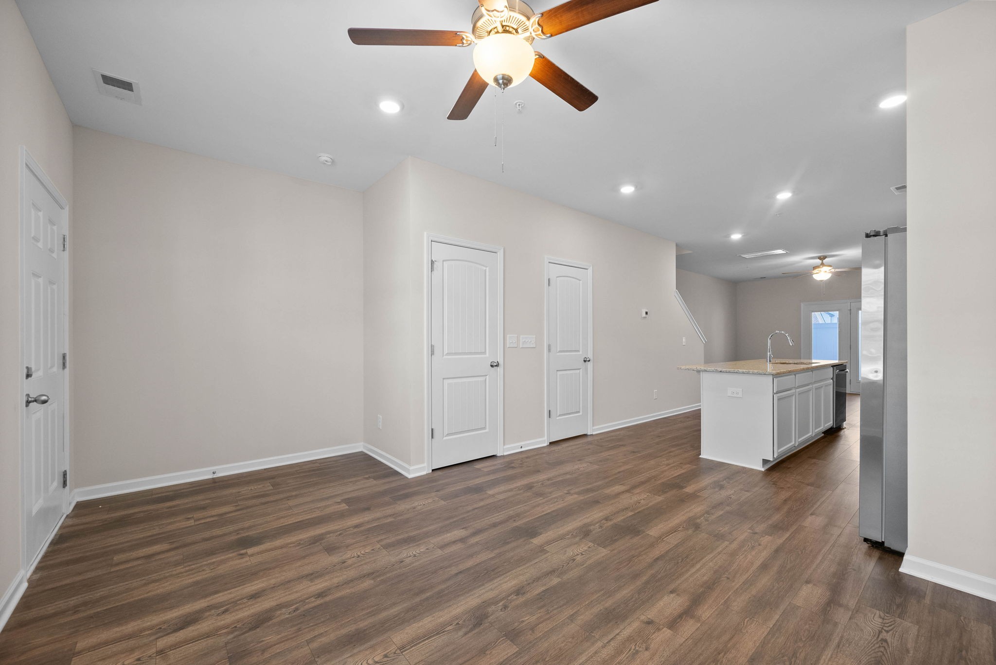 175 Addi Street Pleasant View, TN 37146 - Photo 4 of 22 a view of an empty room and wooden floor