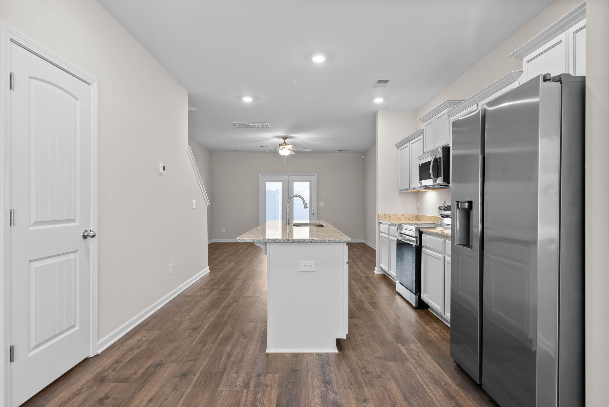 175 Addi Street Pleasant View, TN 37146 - Photo 7 of 22 a kitchen with stainless steel appliances a refrigerator sink and microwave