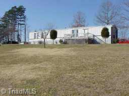 400 Robert Owens Road Pinnacle, NC 27043 - Photo 1 of 9 Exterior Front.
